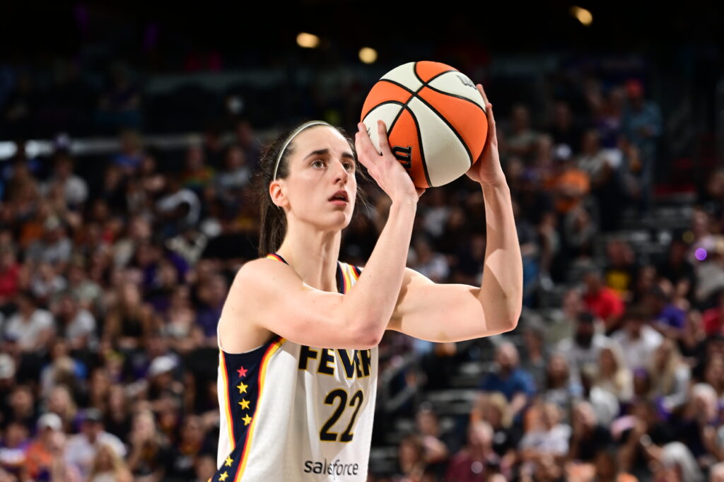 Caitlin Clark lines up a free throw during an Indiana Fever game.