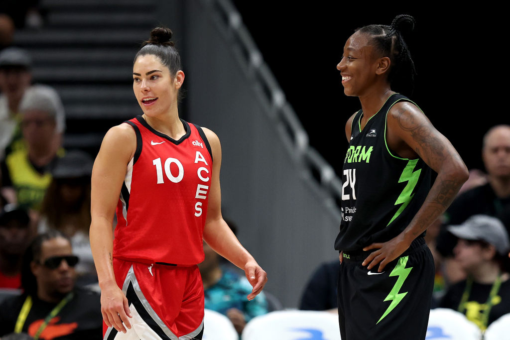 WNBA trade subjects Kelsey Plum of the Las Vegas Aces and Jewell Loyd of the Seattle Storm look on during the fourth quarter of a WNBA game.