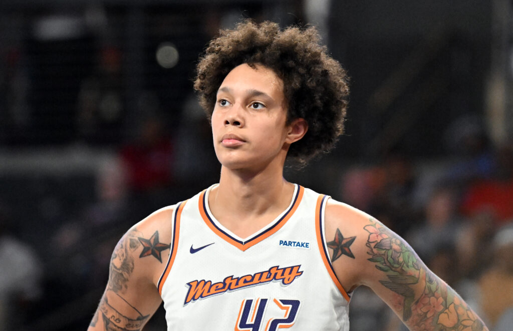 WNBA star Brittney Griner looks on during a Phoenix Mercury game.