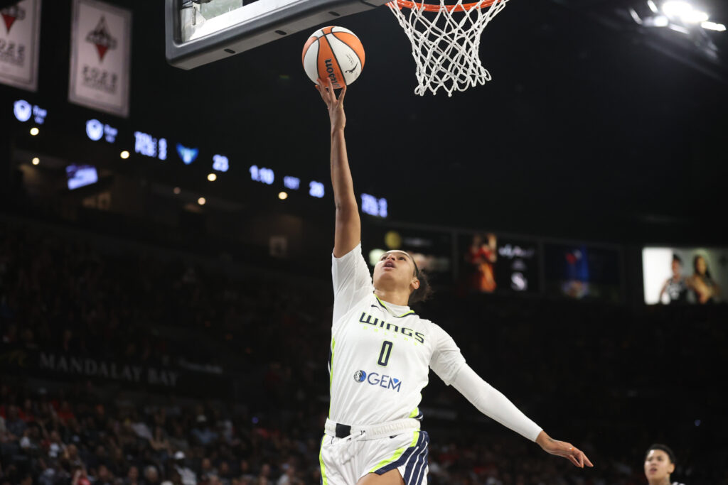 Dallas Wings forward Satou Sabally lays up a shot during a 2024 WNBA game.