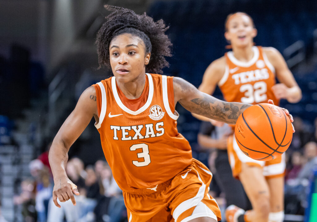 Texas star Rori Harmon dribbles the call up the court during an NCAA basketball game.