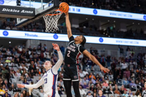 South Carolina's Ashlyn Watkins dunks the ball over TCU's Sedona Prince.