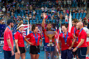 Coco Gauff waves to the crowd with her US teammates at the 2025 United Cup.