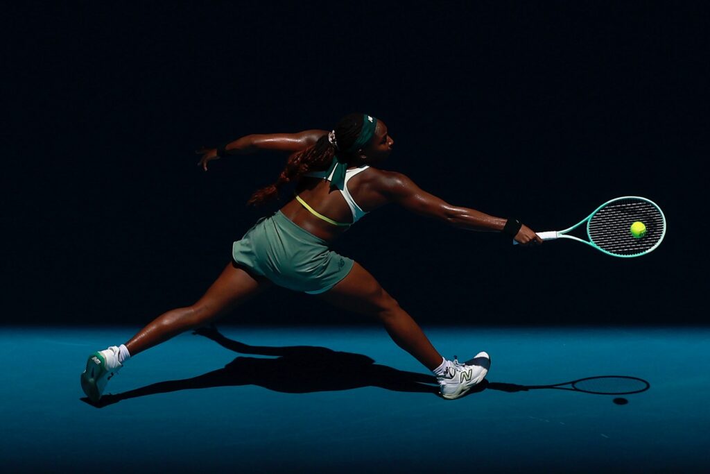 Coco Gauff reaches for the ball during her 2025 Australian Open quarterfinal.