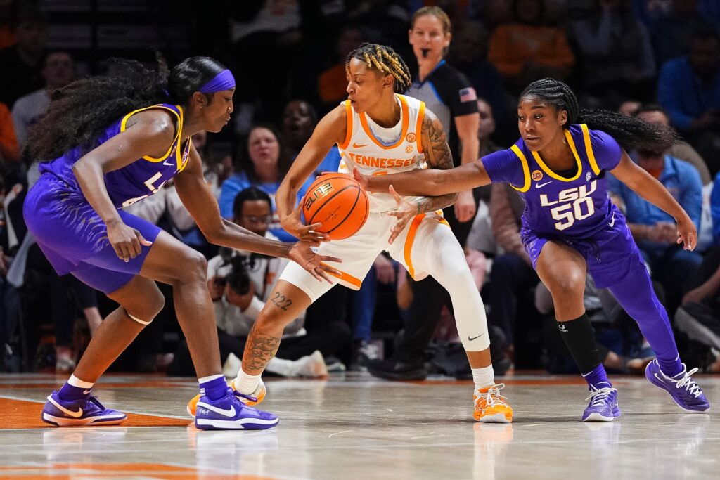 LSU's Shayeann Day-Wilson tries to knock the ball away from Tennessee's Ruby Whitehorn during a game.