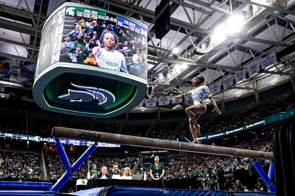 Michigan State gymnast Olivia Zsarmani competes on the beam during a 2025 meet.