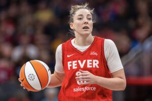 Fever forward Katie Lou Samuelson dribbles the ball during a 2024 WNBA game.