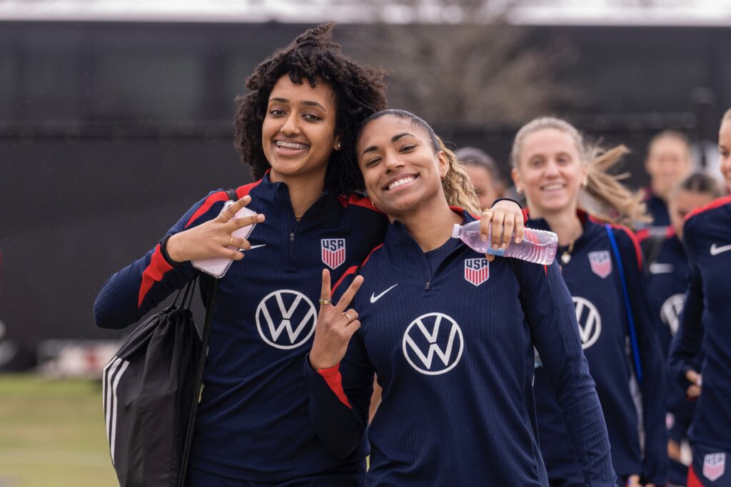 USWNT players Lily Yohannes and Catarina Macario pose for a photo before training for the 2025 SheBelieves Cup.