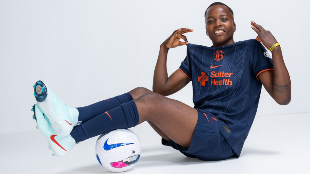 Bay FC star Racheal Kundananji poses in the NWSL club's first fully branded kit for the 2025 season.