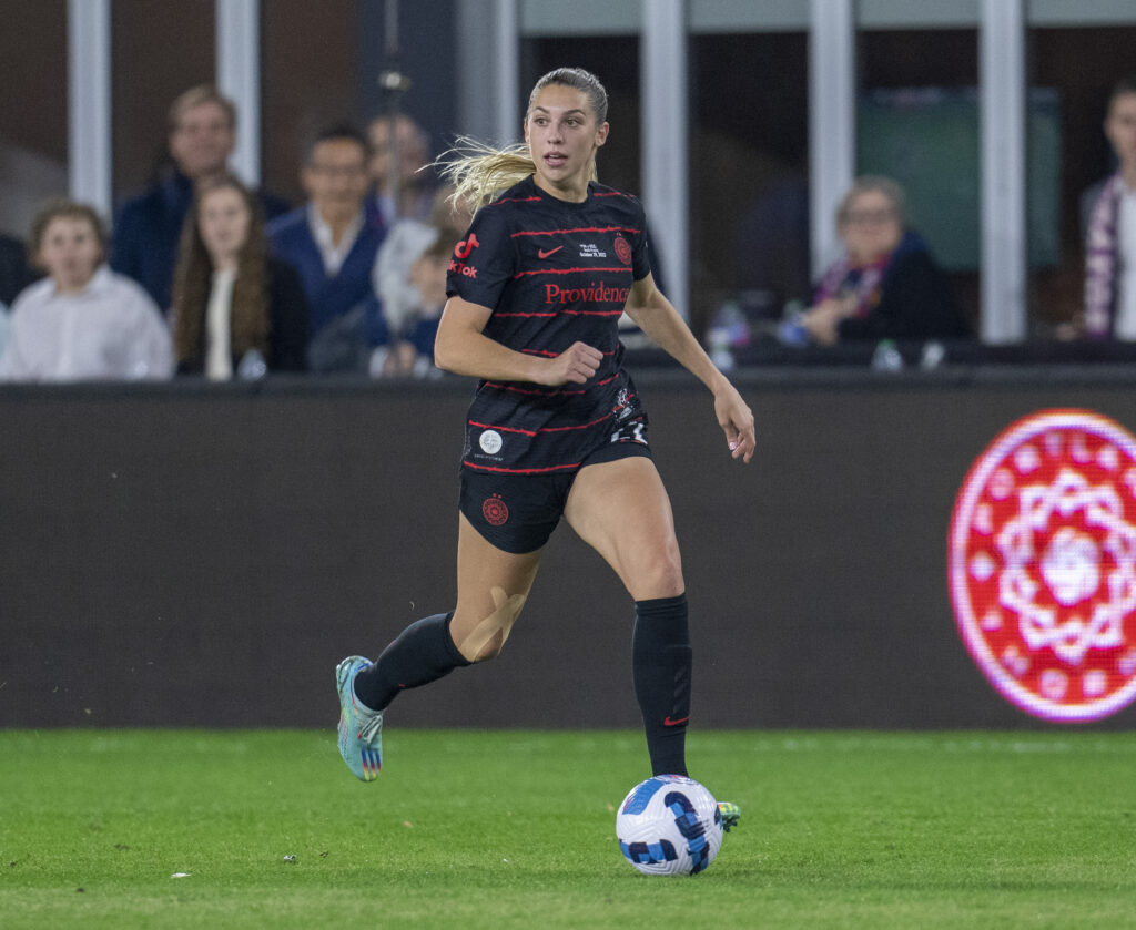 Portland Thorns forward Morgan Weaver dribbles the ball during the 2022 NWSL final against Kansas City.