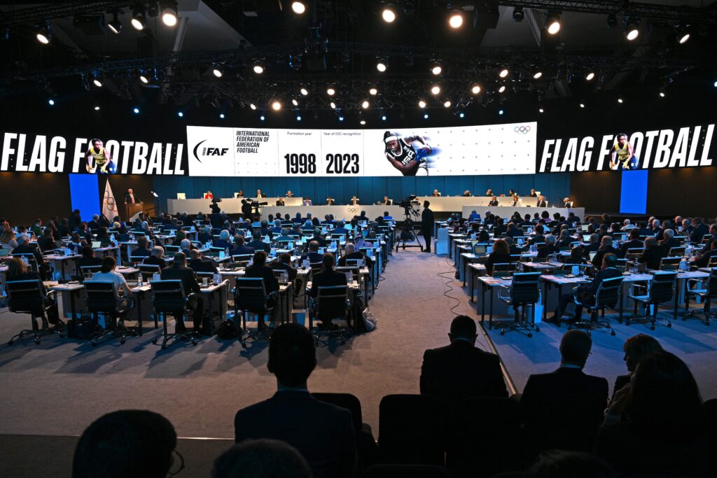 Flag football is announced as one of five sports debuting at the 2028 Olympics during a 2023 IOC meeting.