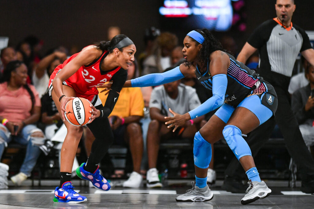 Atlanta's Cheyenne Parker-Tyus guards Las Vegas's A'ja Wilson during a 2024 WNBA game.