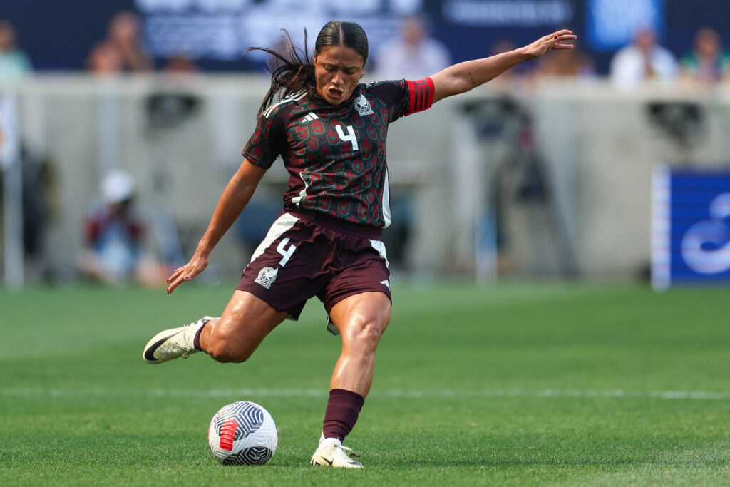 Mexico defender Rebeca Bernal kicks the ball during a 2024 friendly against the USWNT.