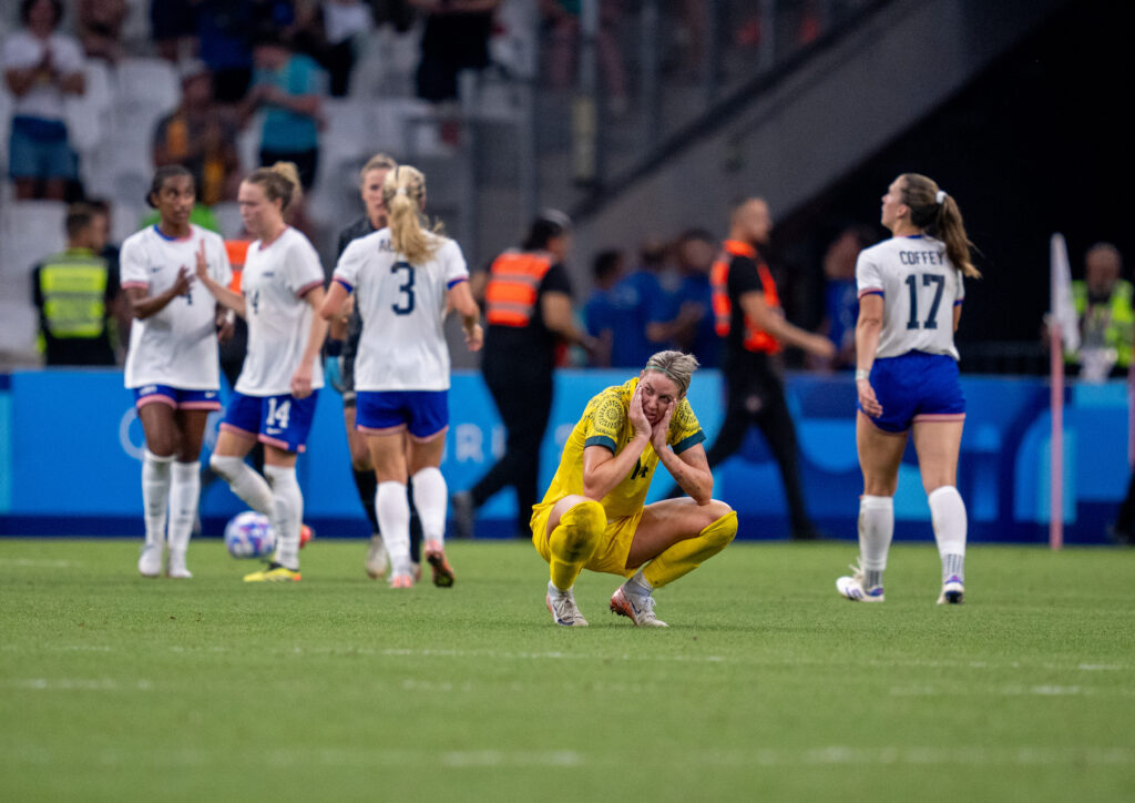 Australia's Alanna Kennedy reacts to losing the final 2024 Olympics group stage match to the USWNT.