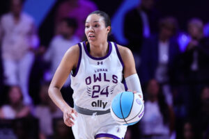 Lunar Owls forward Napheesa Collier dribbles the ball during an Unrivaled game.