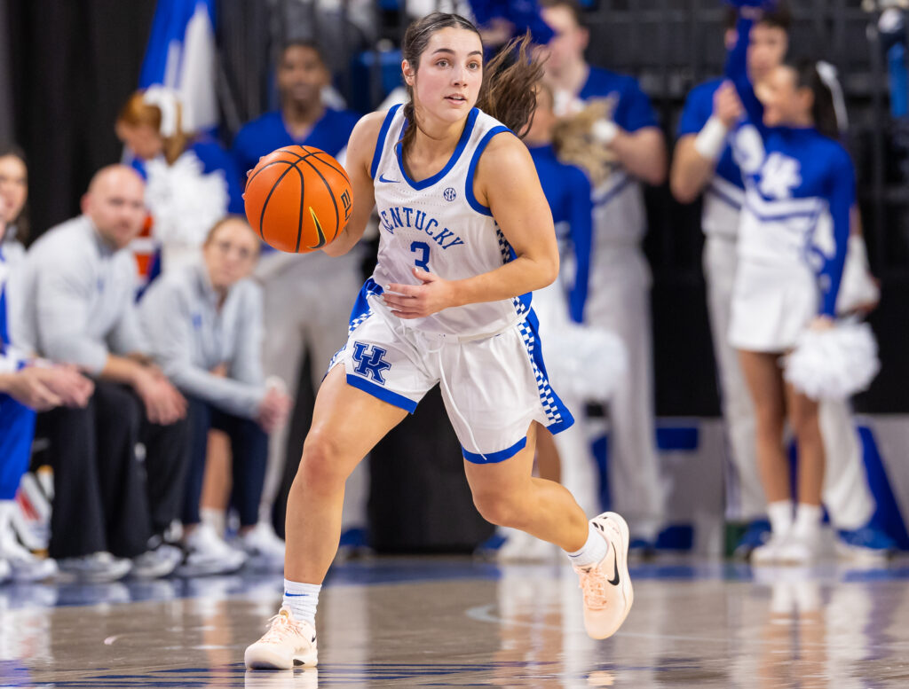 Kentucky's Georgia Amoore dribbles the ball up the court during a game.