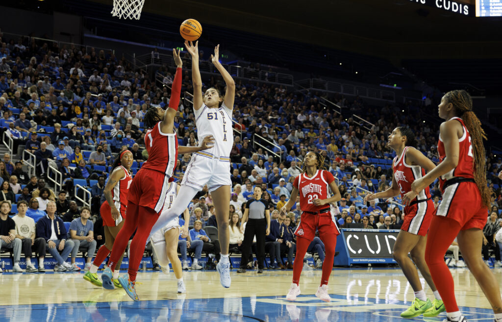 UCLA center Lauren Betts lifts a shot over Ohio State during Wednesday's Big Ten basketball game.