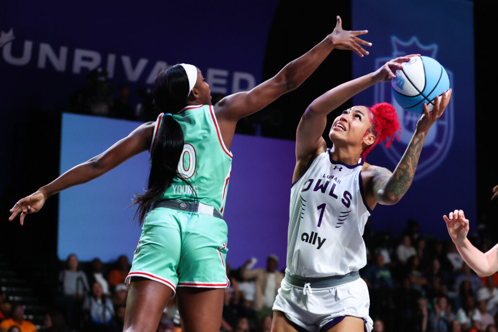 The Laces' Jackie Young tries to defend a shot from the Lunar Owls' Shakira Austin during and Unrivaled 3x3 game.