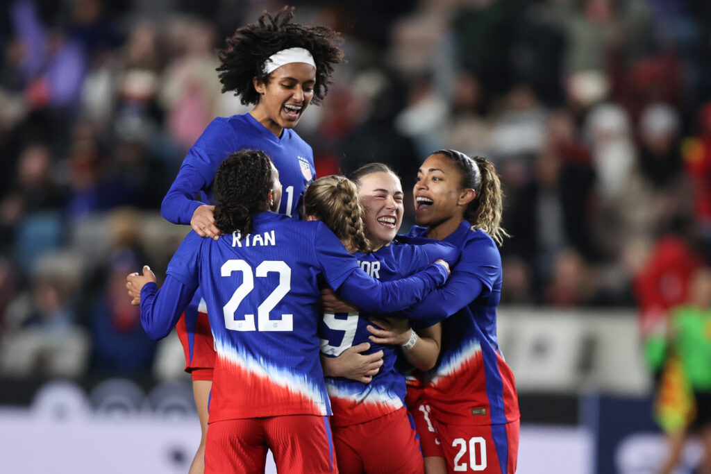 USWNT teammates celebrate Ally Sentnor's first international goal during Thursday's match.