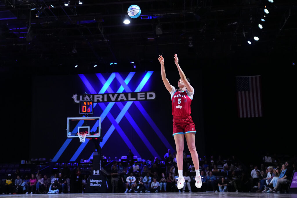 Vinyl star Dearica Hamby launches a shot during an Unrivaled game.