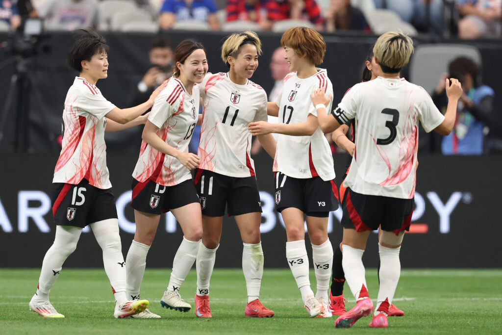 Japan forward Mina Tanaka celebrates her tournament-leading fourth goal with her teammates at the 2025 SheBelieves Cup.