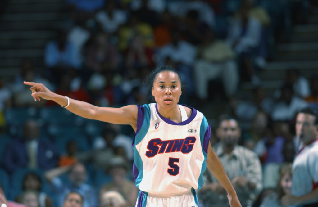 Charlotte Sting guard Dawn Staley directs a play during a 2002 WNBA game.