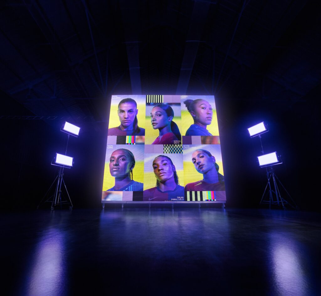 Nike United cleats pack promotional image showing headshots of women's soccer stars flanked by neon lights.