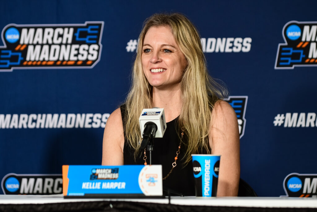 Then-Tennessee head coach Kellie Harper talks to the media  during a press conference after a 2023 March Madness game.