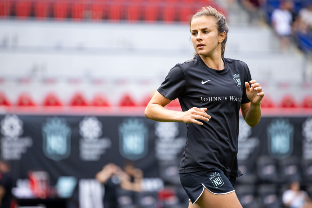 Gotham FC midfielder Nealy Martin warns up before an NWSL match.