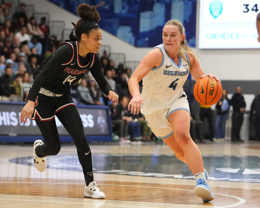 Harvard's Harmoni Turner defends Columbia's Fliss Henderson during a 2024 Ivy League tournament semifinal.