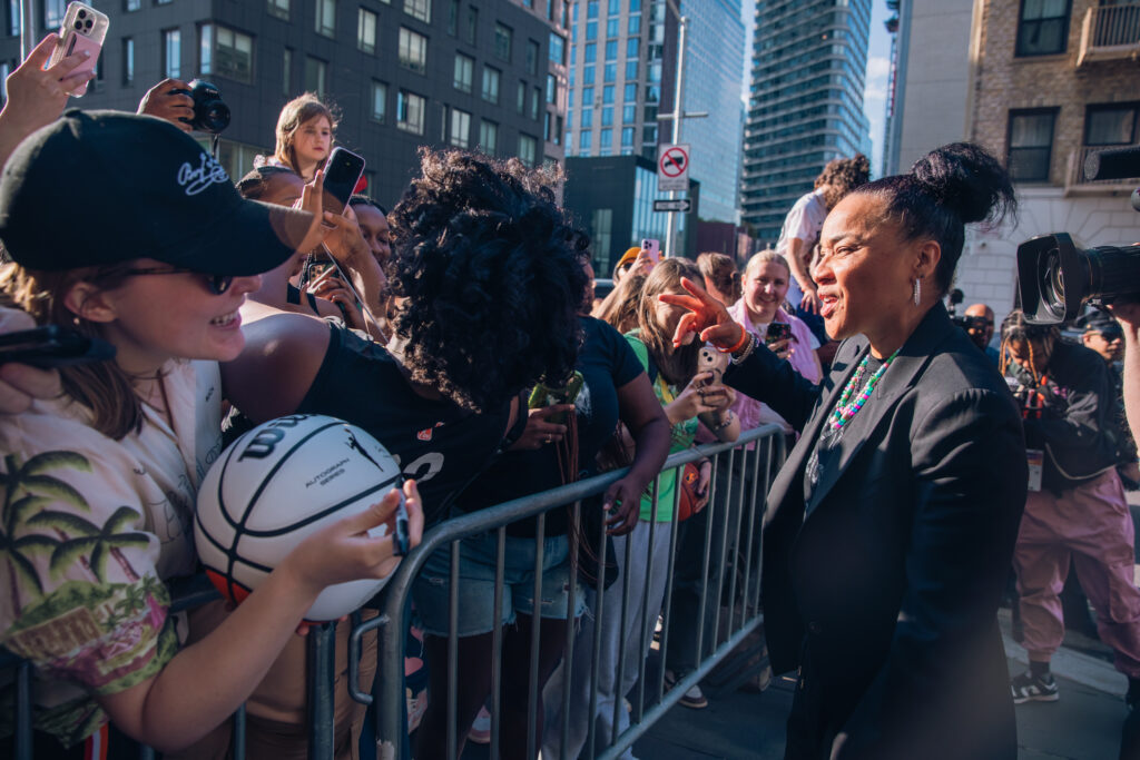 South Carolina head coach Dawn Staley greets fans at the 2024 WNBA Draft.