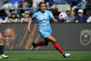 Chicago's Mallory Swanson chases down the ball during a 2024 NWSL game.