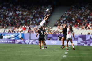 US rugby player Alena Olsen catches the ball during a 2024 Olympic semifinal.