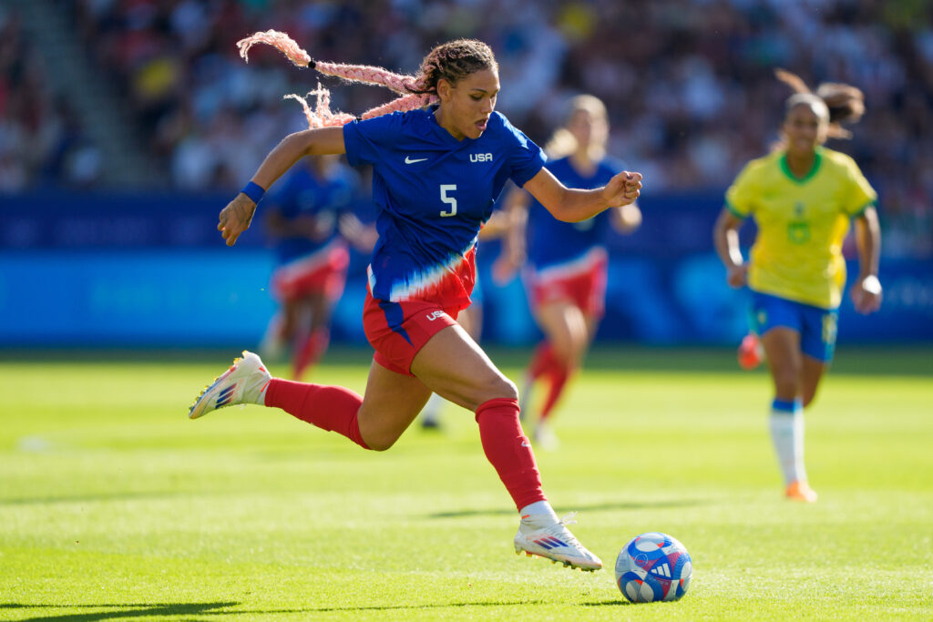 Trinity Rodman dribbles the ball during the USWNT's 2024 Olympic gold-medal winning match in Paris.