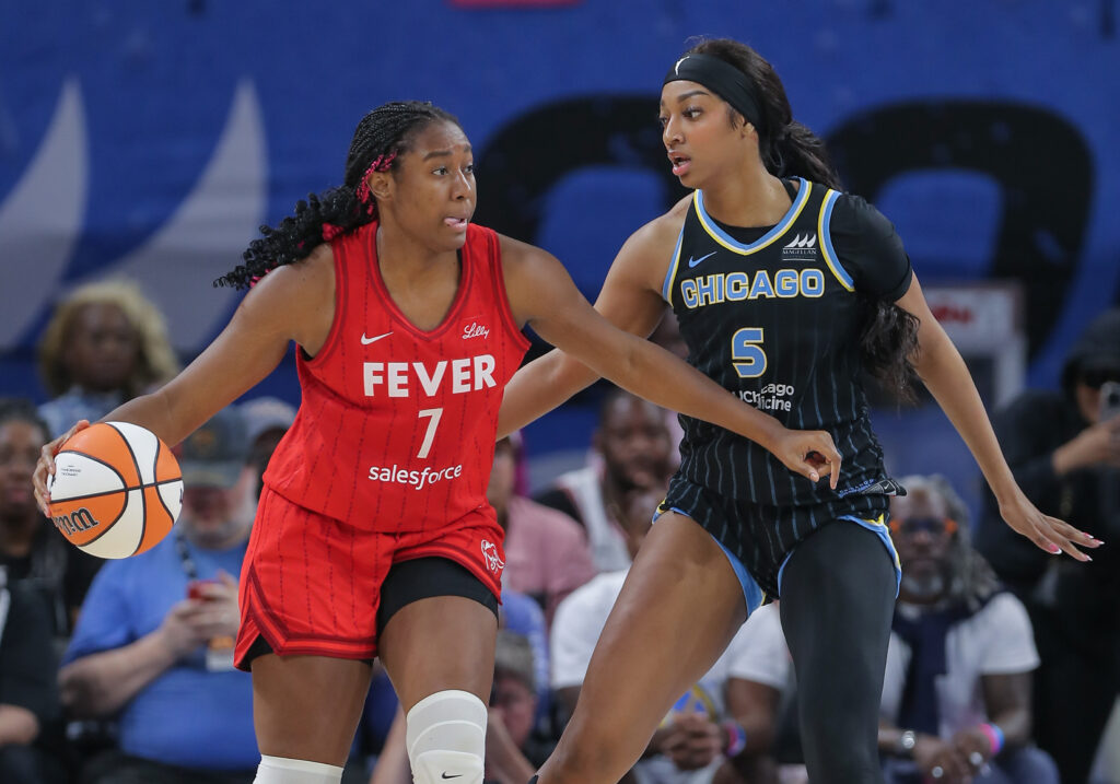 Chicago's Angel Reese guards Indiana's Aliyah Boston during a 2024 WNBA game.