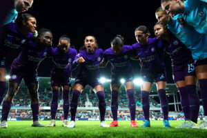 Orlando Pride captain Marta gives her team a pep talk in a huddle before the 2024 NWSL Championship match.