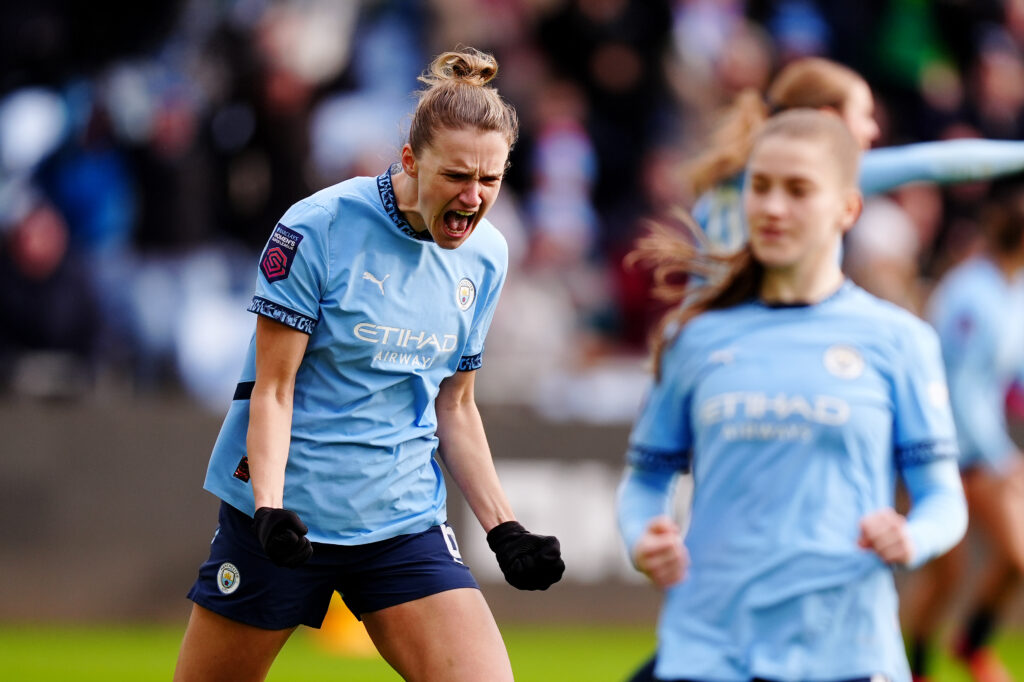 Manchester City attacker Vivianne Miedema celebrates a goal during a 2025 WSL match.