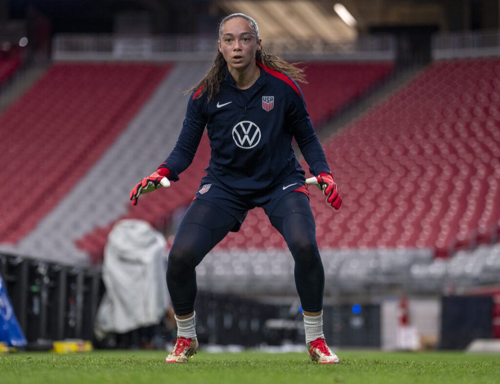 USWNT goalkeeper Phallon Tullis-Joyce prepares to make a save during training.