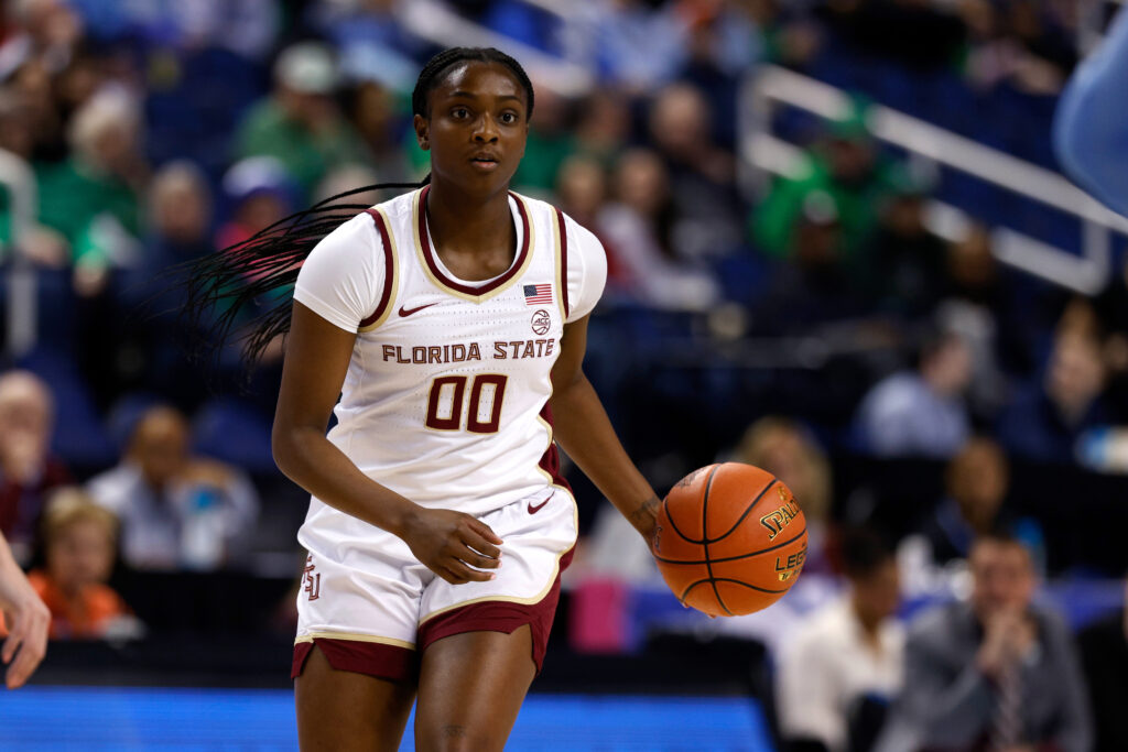 Florida State's Ta'Niya Latson dribbles the ball up the court during a 2025 ACC tournament game.