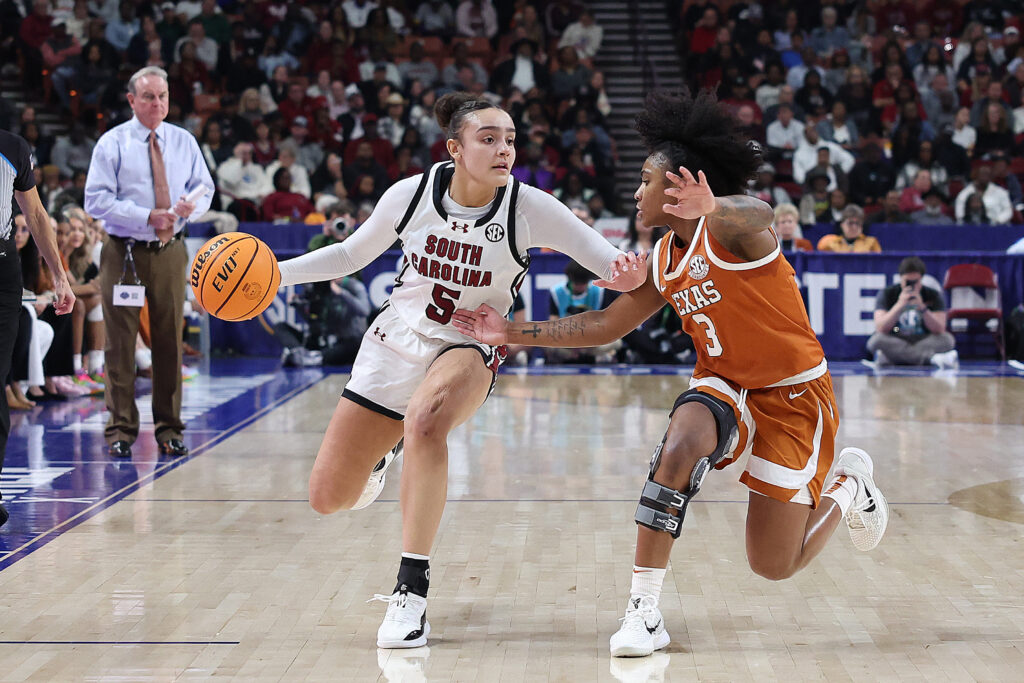 Texas guard Rori Harmon defends against South Carolina's Tessa Johnson during the 2025 SEC tournament final.