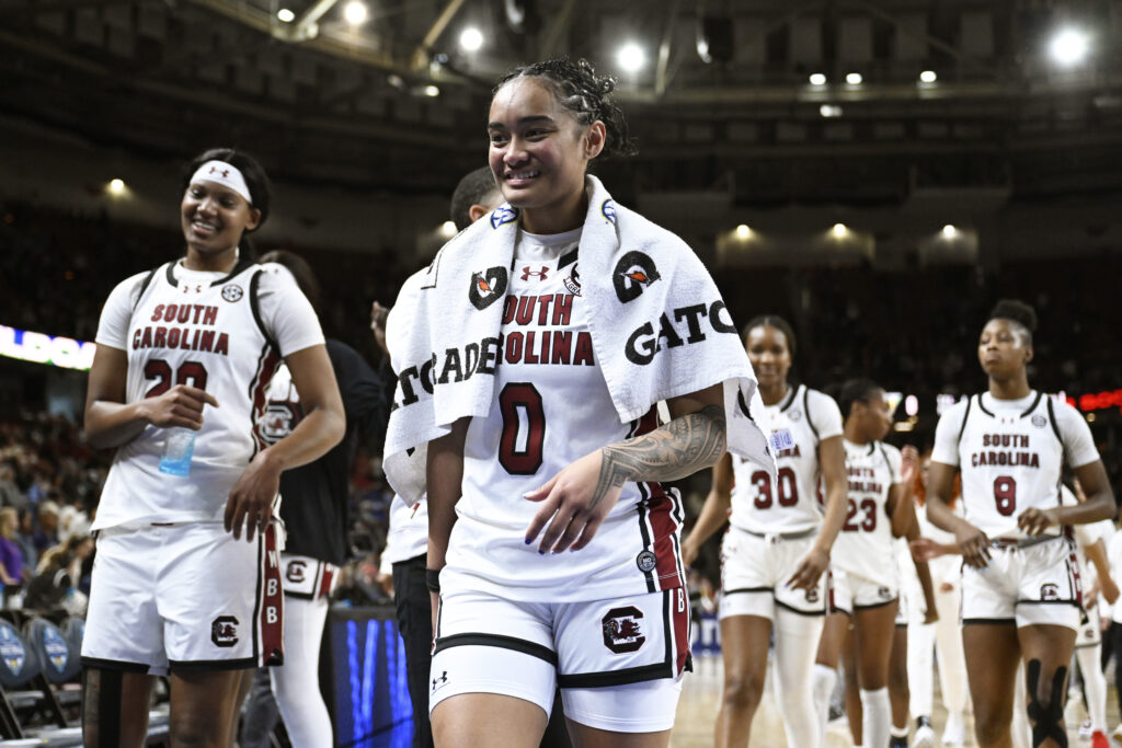 Te-Hina Paopao and her South Carolina teammates walk off the court after a 2025 SEC tournament win.