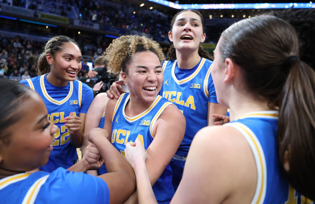 UCLA celebrates their Big Ten conference tournament championship win on Sunday.