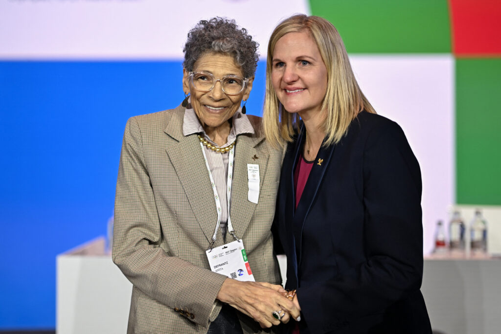 IOC trailblazer Anita DeFrantz congratulates the organization's newly elected president Kirsty Coventry.