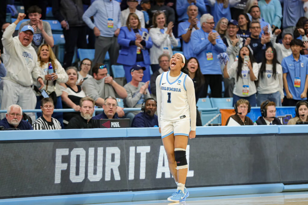 Forward Perri Page celebrates a play during Columbia's 2025 First Four March Madness win over Washington.