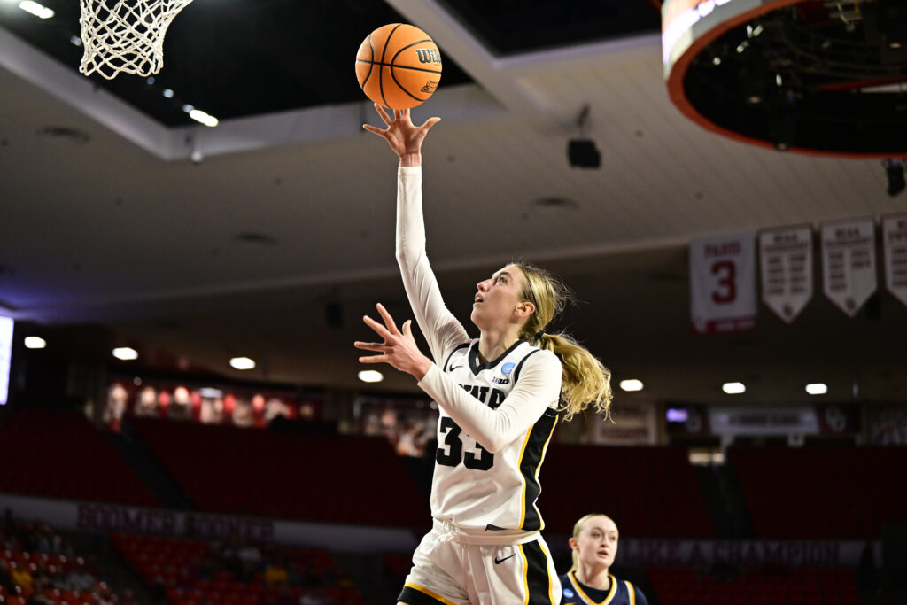 Iowa's Lucy Olsen lays up a shot during the Hawkeyes' 2025 March Madness first round game.