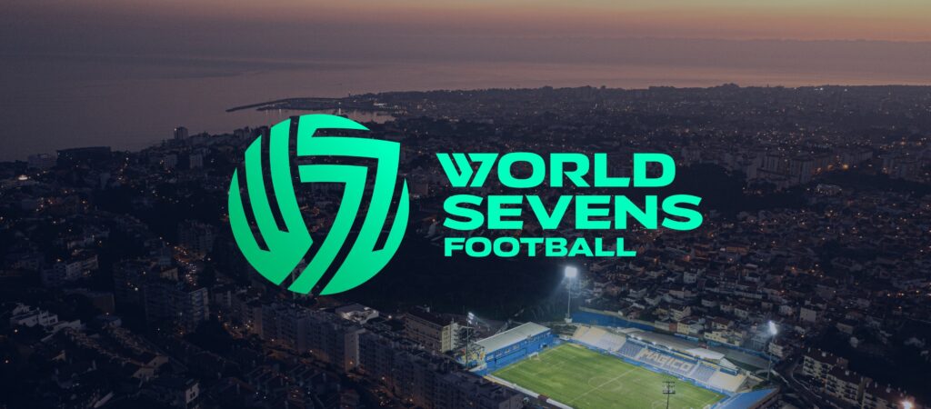 The W7F logo is displayed over an overhead night image of a soccer stadium.