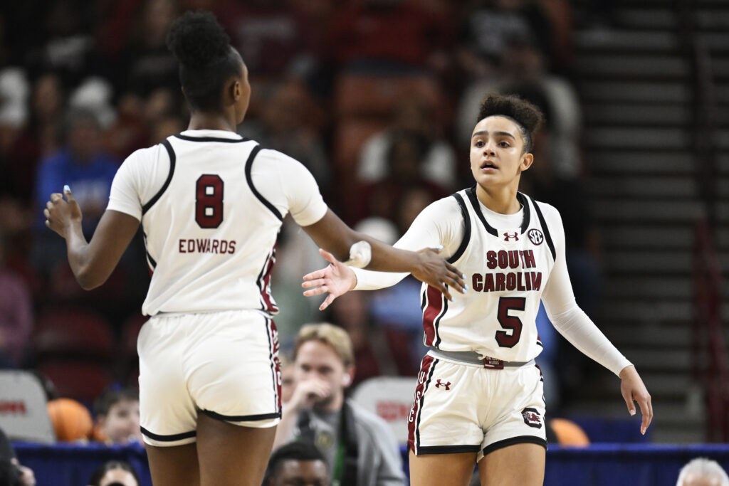 South Carolina's Joyce Edwards and Tessa Johnson high-five during a 2025 NCAA basketball game.