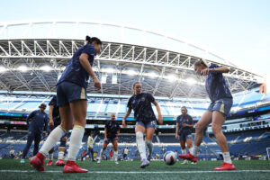 Seattle's Ainsley McCammon and Ana-Maria Crnogorevic warm up before a 2025 NWSL match.