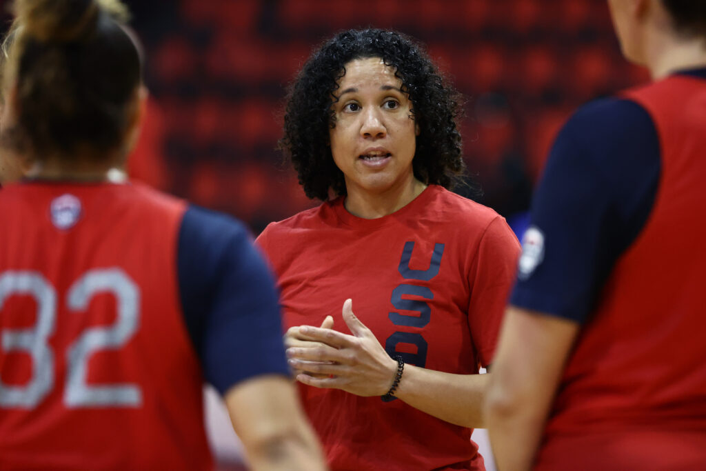 Incoming 2025 FIBA AmeriCup head coach Kara Lawson speaks to players during a USA Basketball practice session.