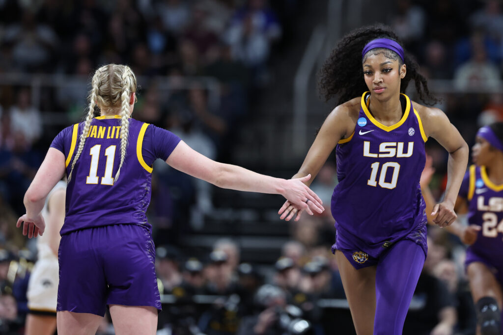 LSU's Hailey Van Lith and Angel Reese high-five during their 2024 Elite Eight NCAA tournament game.